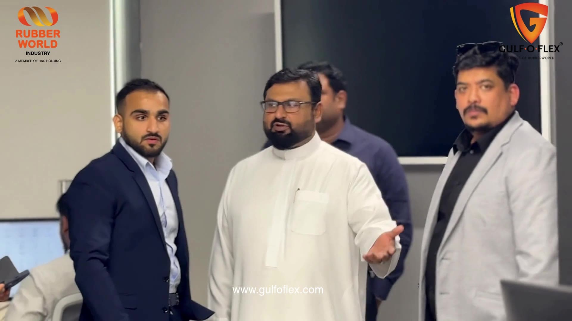Salvo Corporation guests talking with the Gulf-O-Flex team